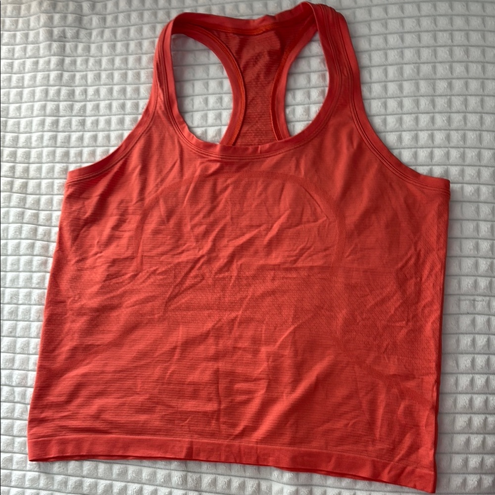 Orange Lululemon swiftly tank top
